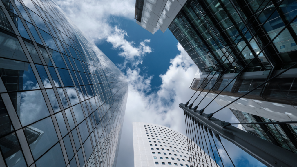 Real estate professionals assisting clients with buying and selling property