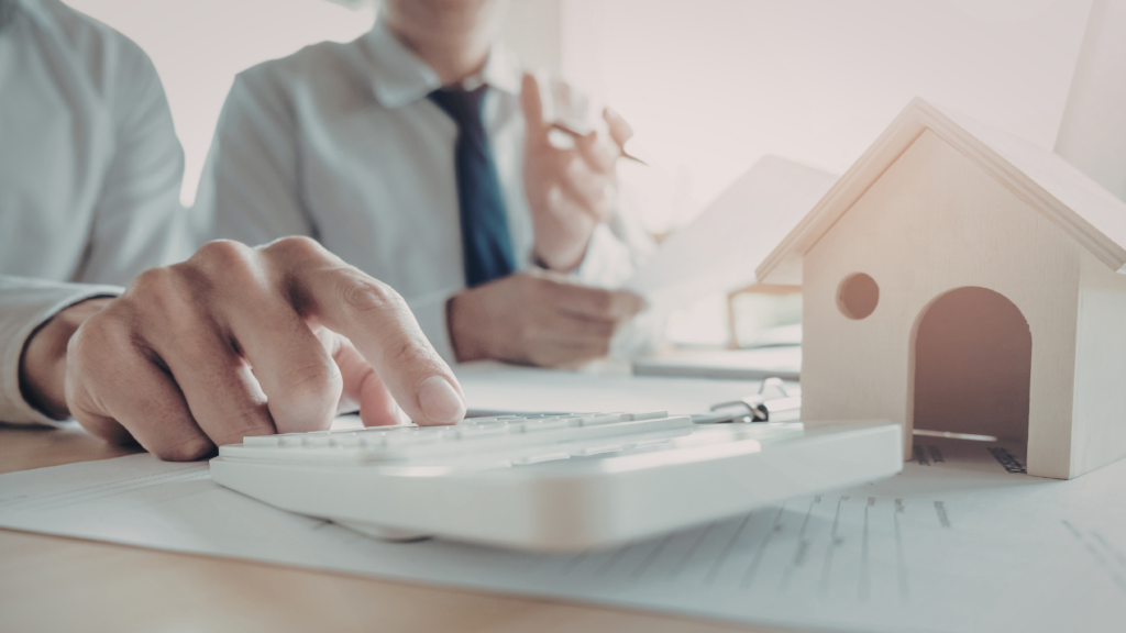 Real estate agent supporting clients during a professional negotiation meeting